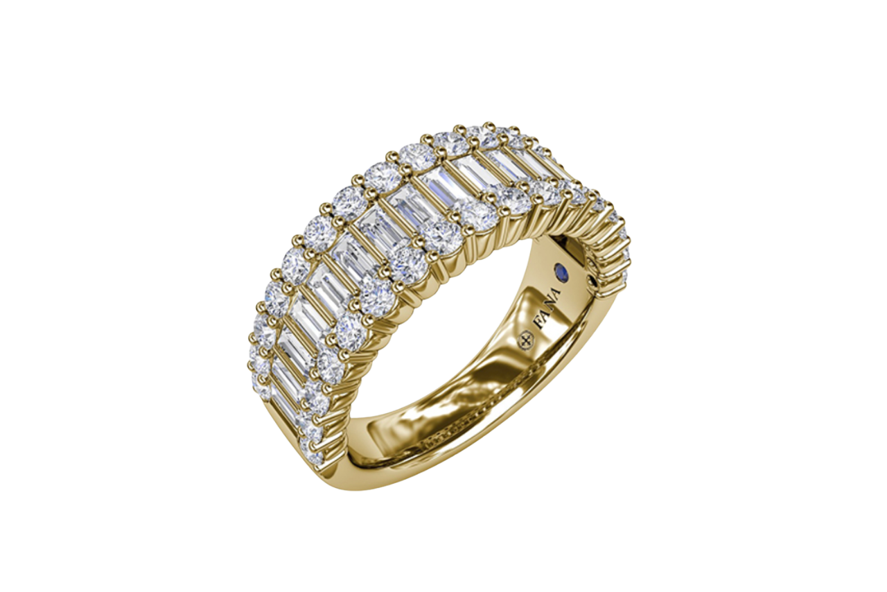 A diamond fashion ring with different shaped diamonds all across it in yellow gold.