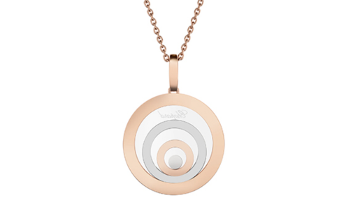 A two-tone Chopard necklace featuring a round pendant with three concentric circles, available at Windsor Jewelers.