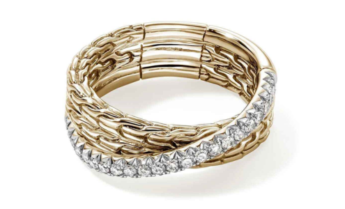 An ornate yellow gold and diamond ring with interwoven bands from John Hardy, available at Windsor Jewelers.