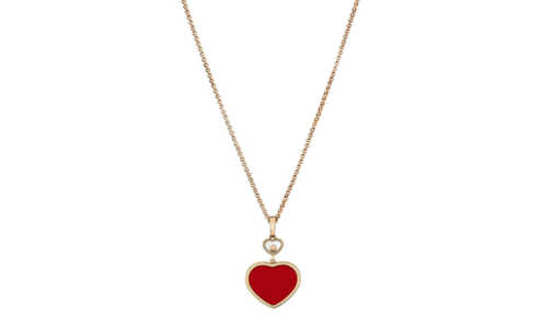 A charming rose gold necklace from Chopard featuring a red heart pendant, available at Windsor Jewelers.