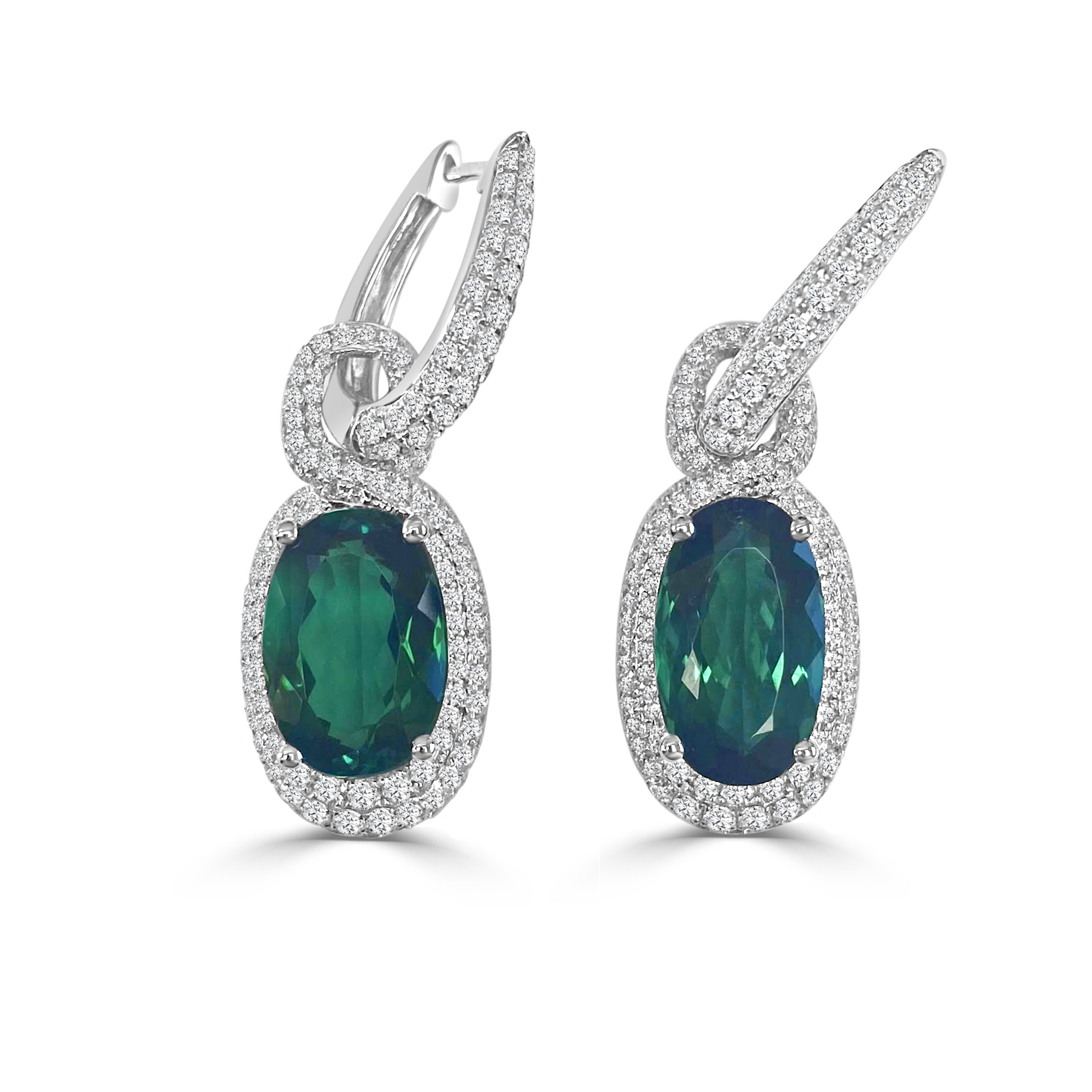 A white gold drop earrings with oval tourmaline and diamond halo.