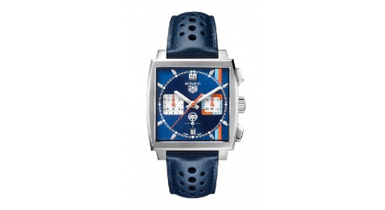 a TAG Heuer watch with a square case and a blue strap