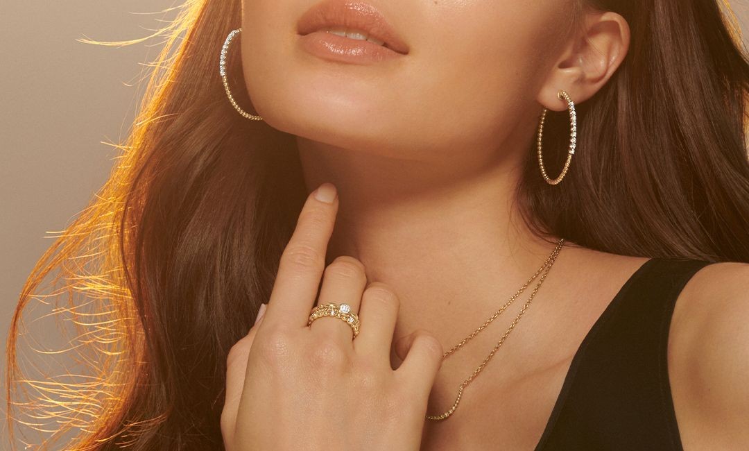Earrings, necklaces, and ring by Gabriel & Co.