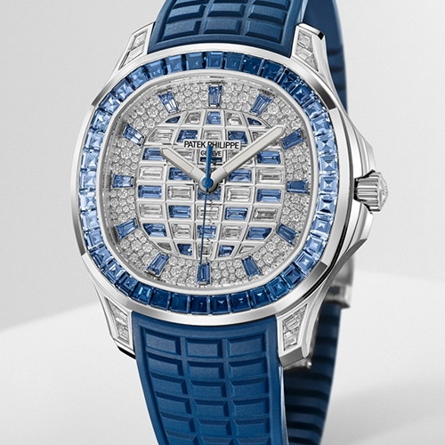 Elegant silver watch with a diamond-encrusted face and blue sapphire accents.
