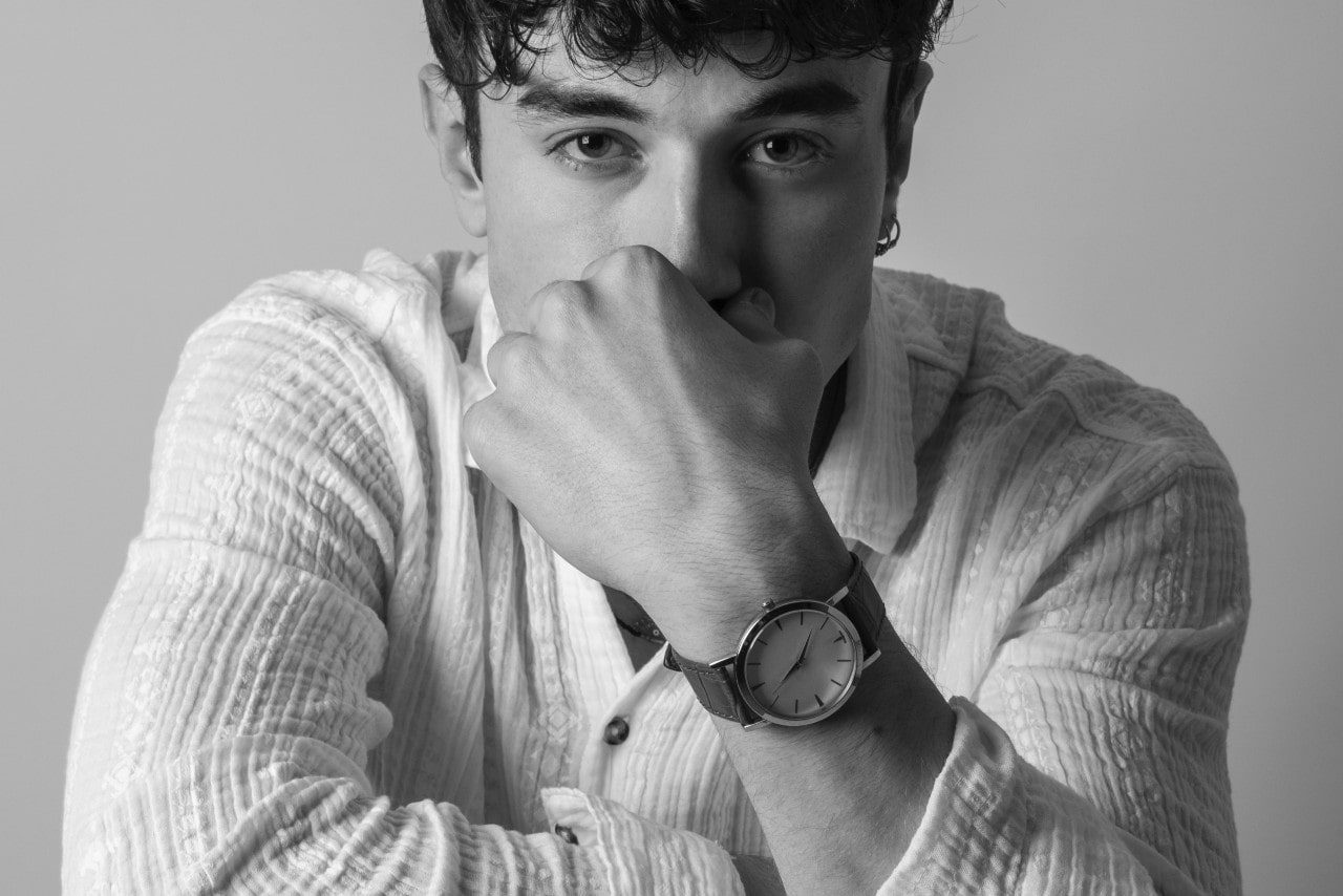 a man wearing a luxury timepiece a man wearing a luxury timepiece